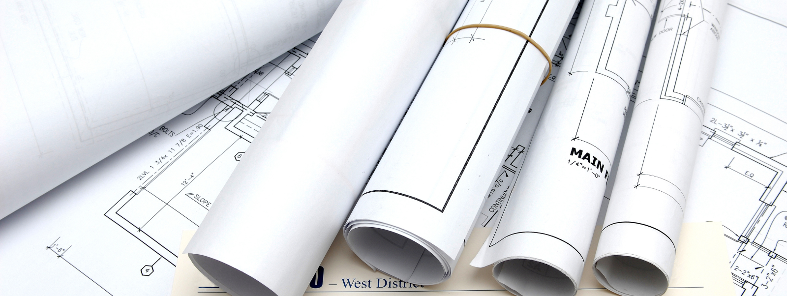 Image of permit drawings rolled up