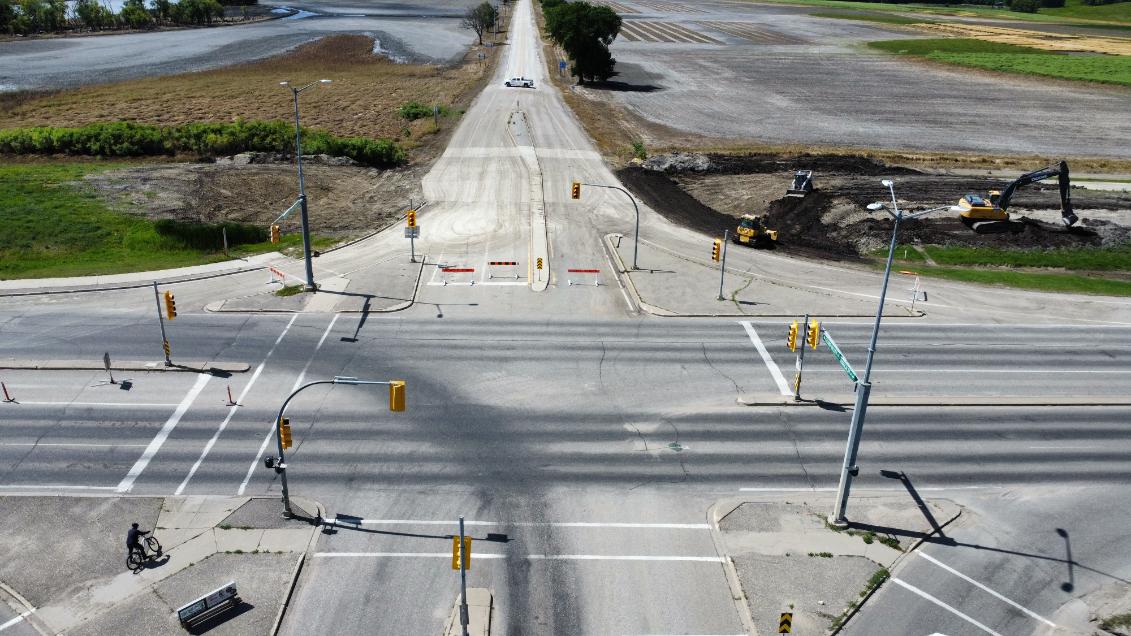 Photo showing Grand Valley Road and 18th St. fully reopen