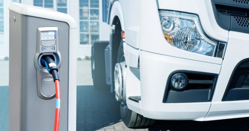 a large vehicle at a charging station