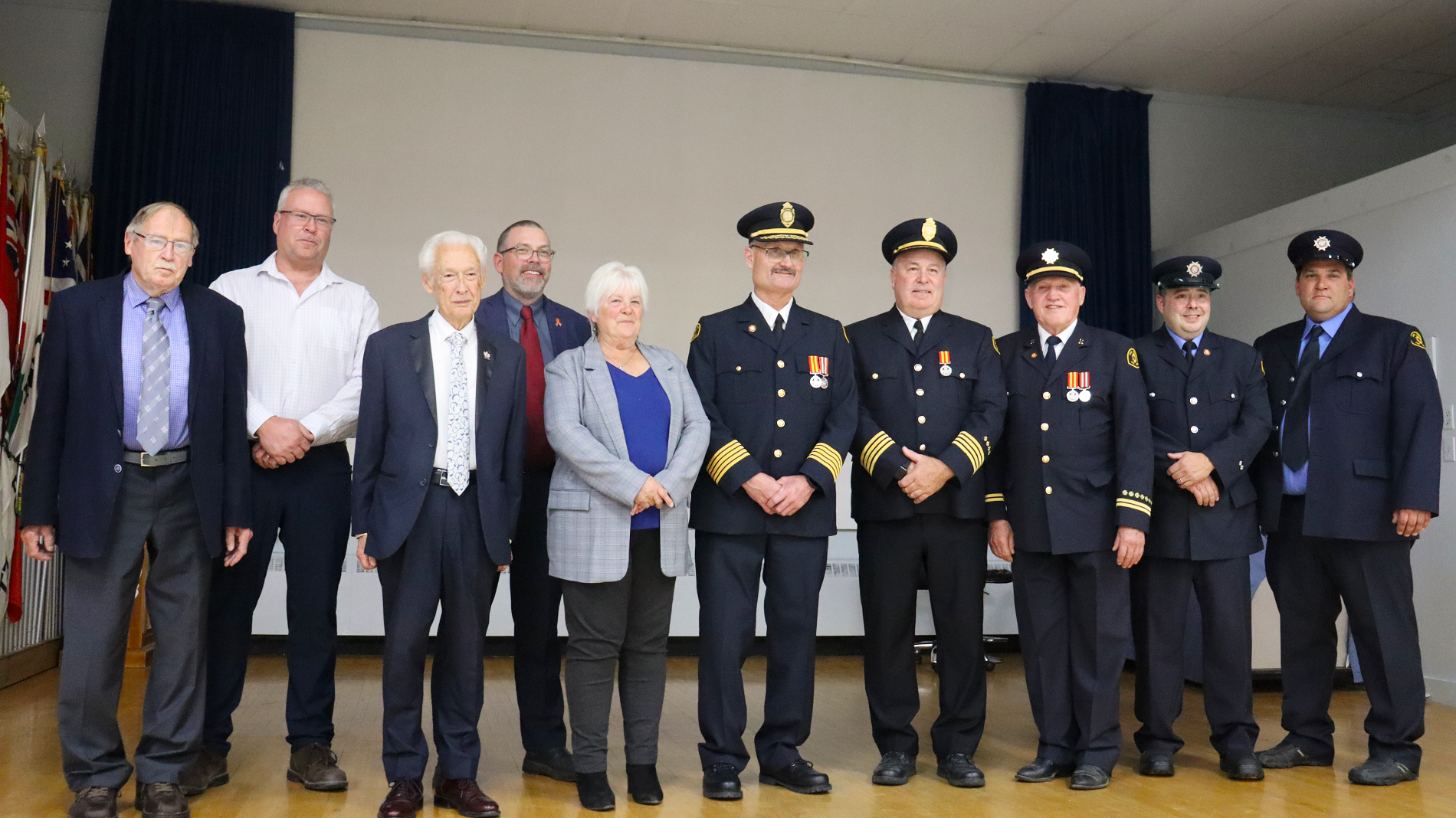 From left to right - Meaford Councillor Harley Greenfield, Georgian Bluffs Councillor Rick Winters, Meaford Mayor Ross Kentner, Georgian Bluffs Acting CAO Niall Lobley, Georgian Bluffs Mayor Sue Carleton, Fire Chief Jeff Gautreau, Deputy Fire Chief Andy Redmond, Ken Goldsmith, Rick Audette, and Dave Guic