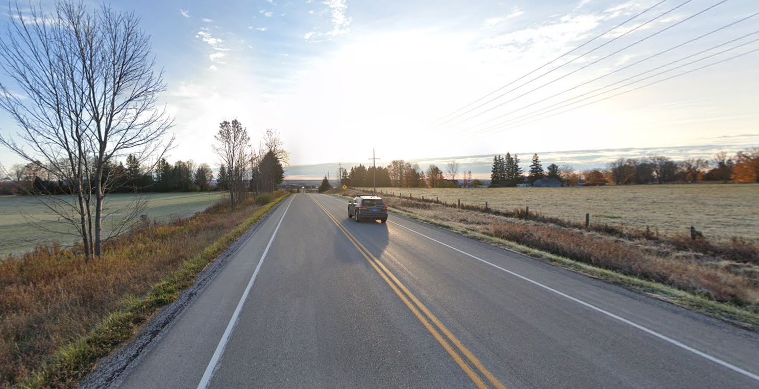 a car on a road in Georgain Bluffs