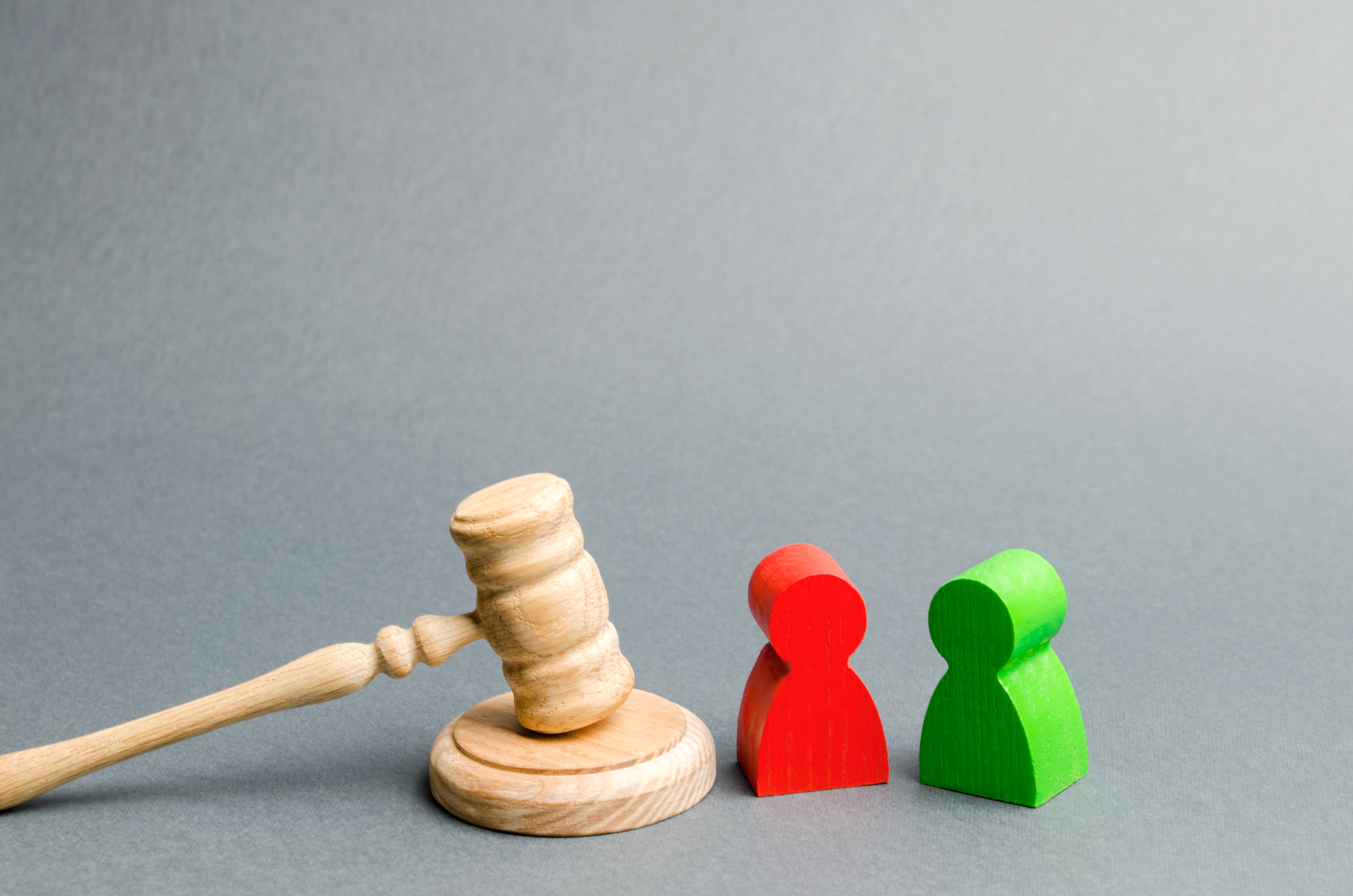 wooden figures and a gavel