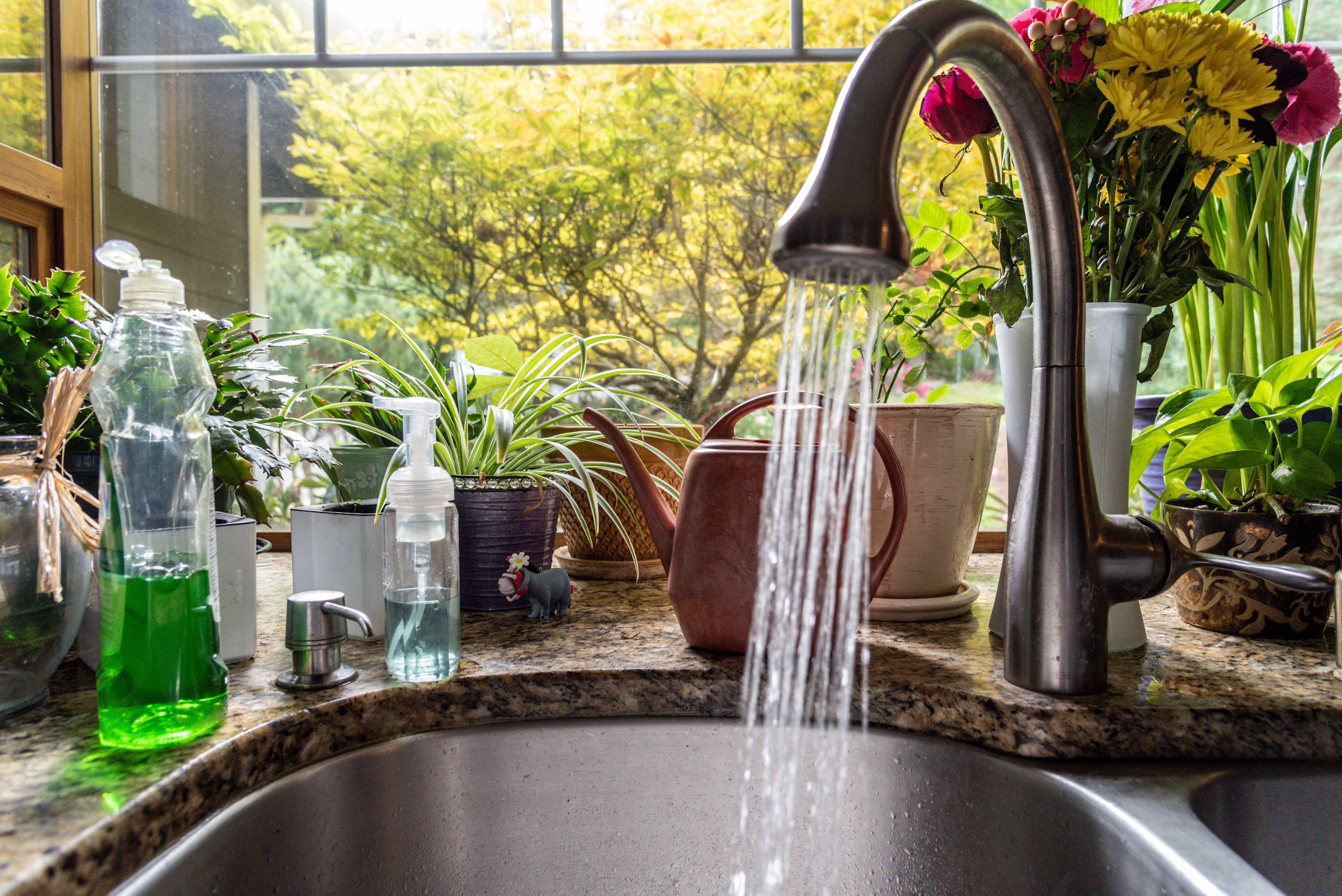A running kitchen faucet