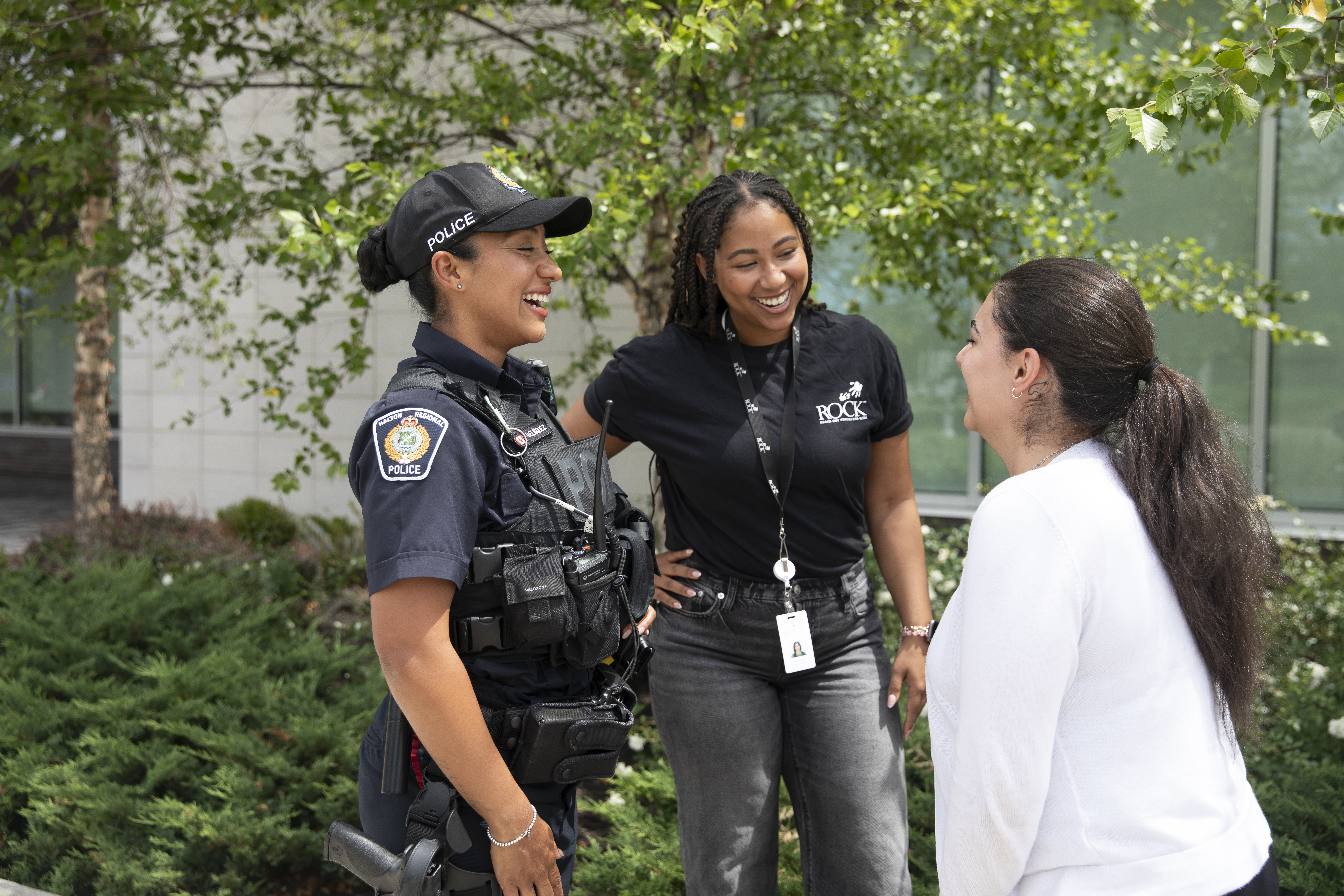 Officer and ROCK staff member speaking with a young person