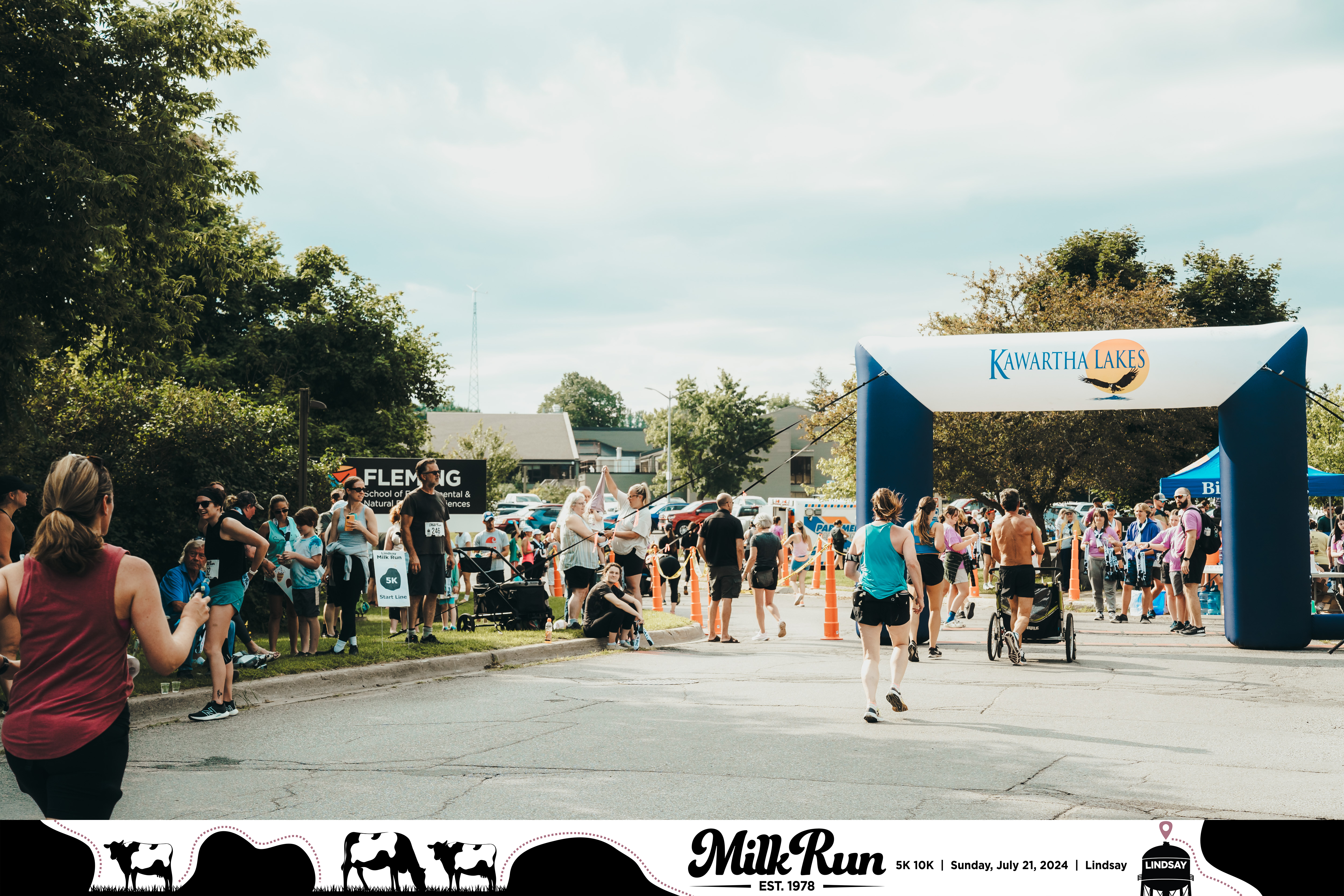 Participants cross the finish line of the Lindsay Milk Run.