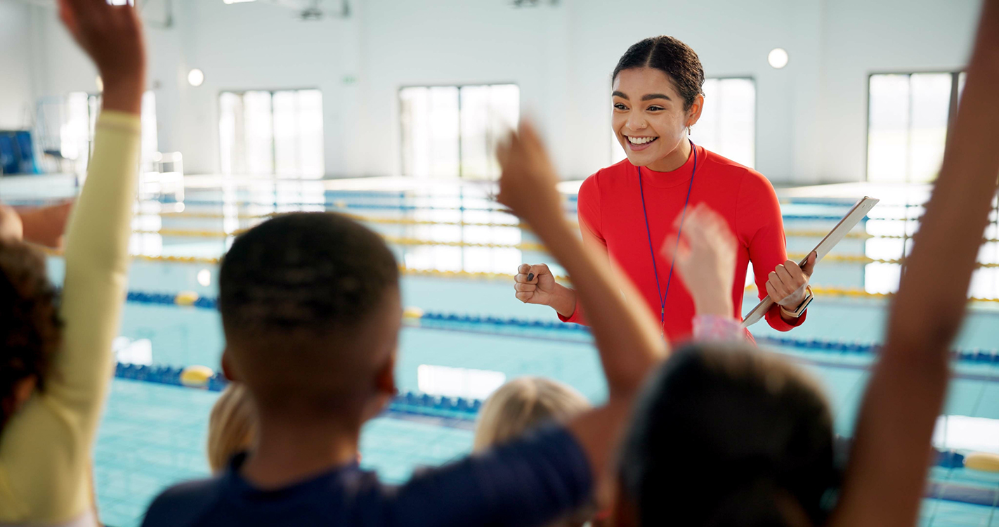Swim instructor with students
