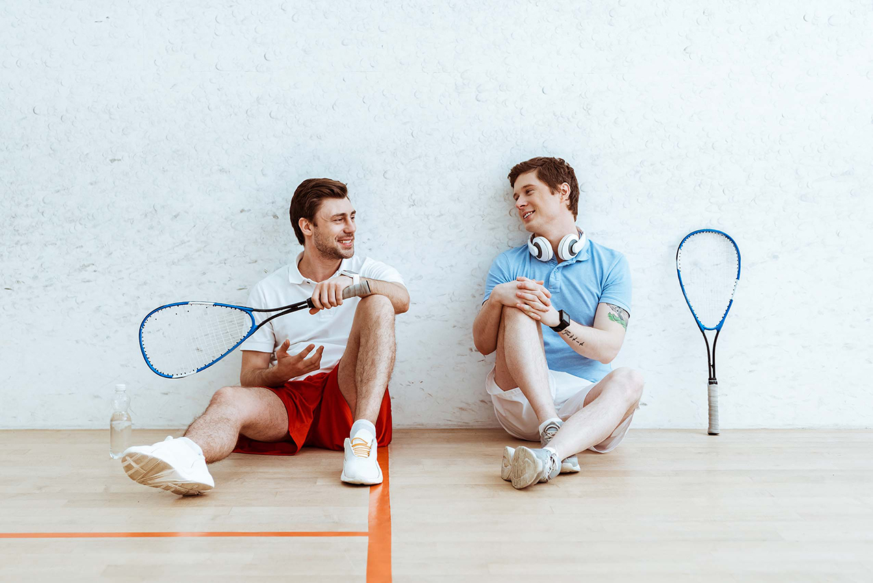 Friends taking a break after a fun round of squash at the Lindsay Recreation Complex