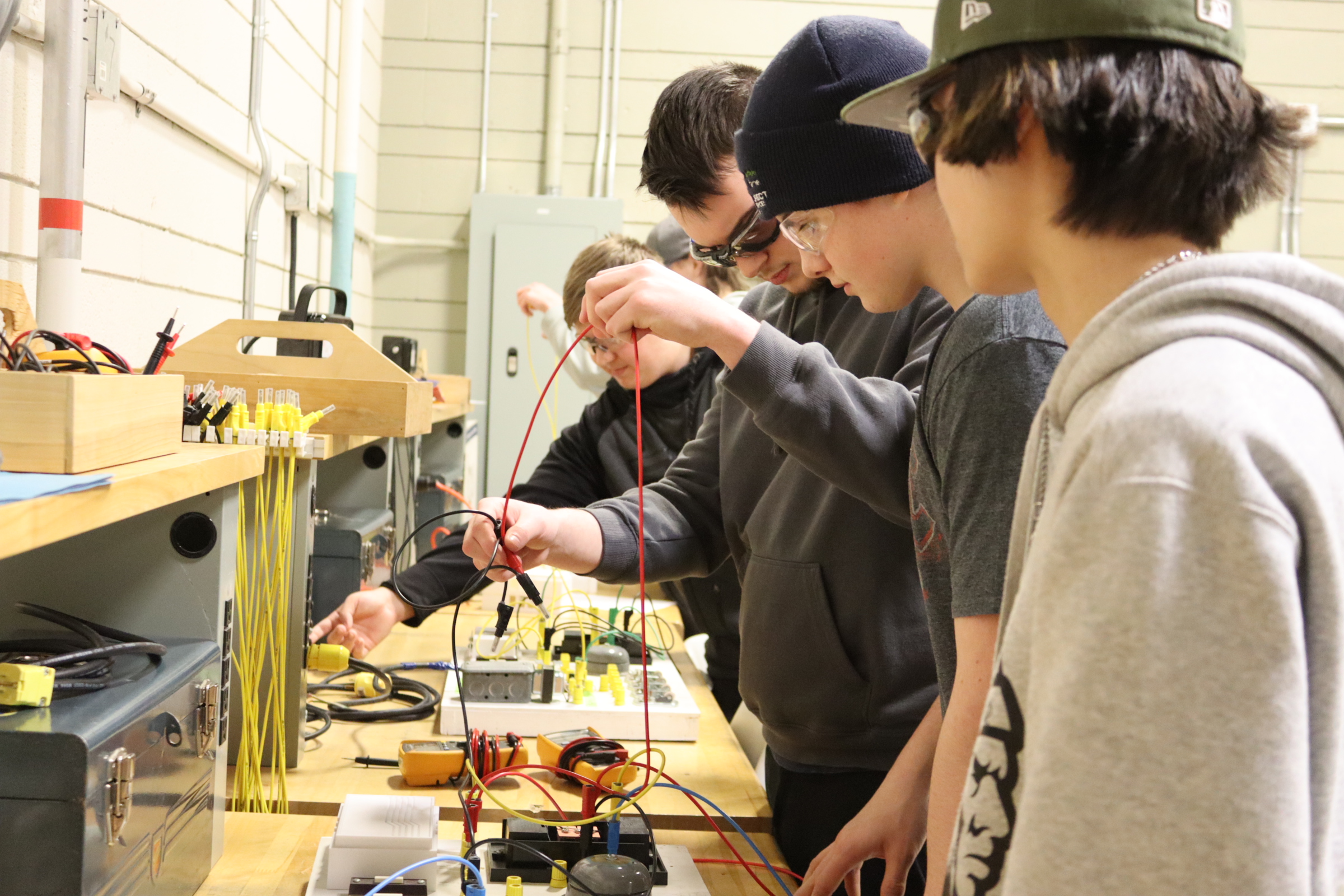 Students working on electrical board