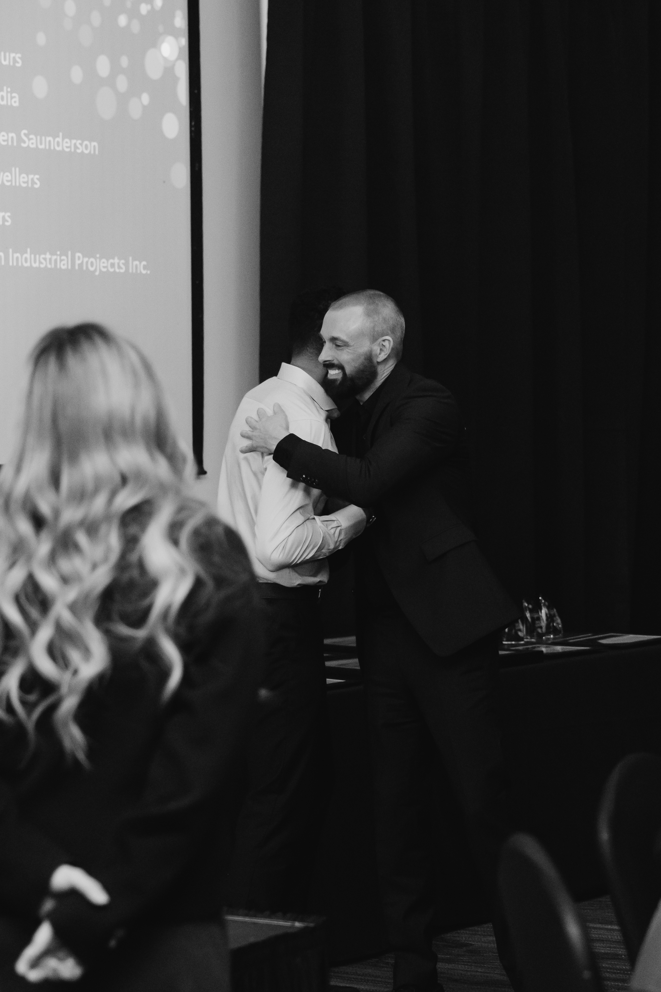Keyano College President connecting with a community member at an event.