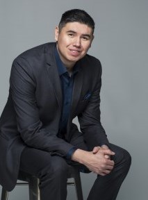 Kendal Netmaker sitting on a chair