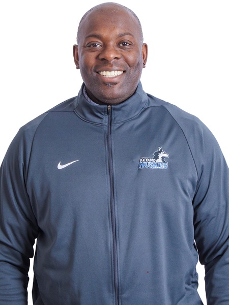 A headshot of Dwayne Vigilance