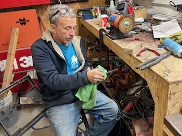 Man polishing metal