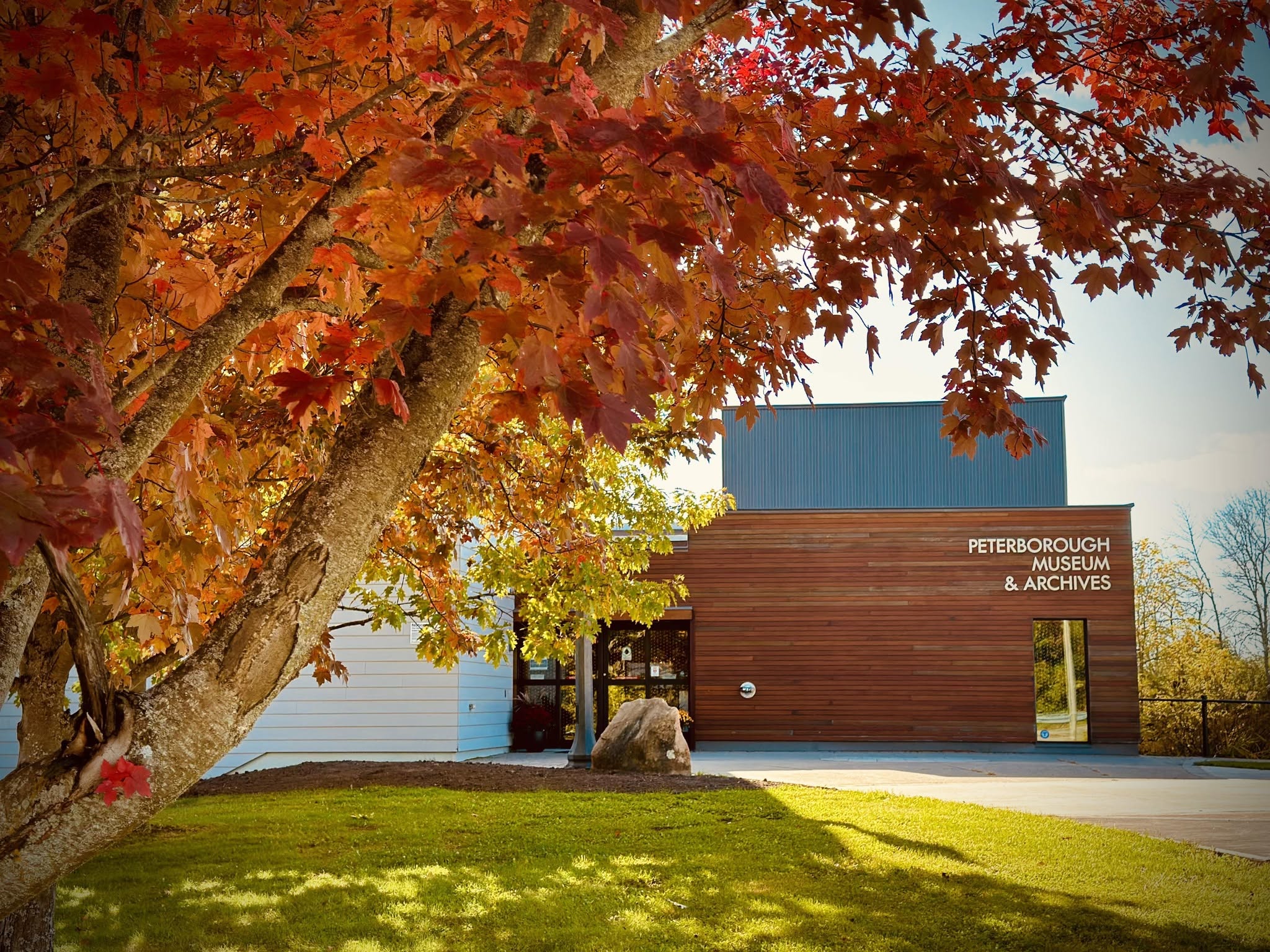 Peterborough Museum and Archives in the fall with colourful leaves