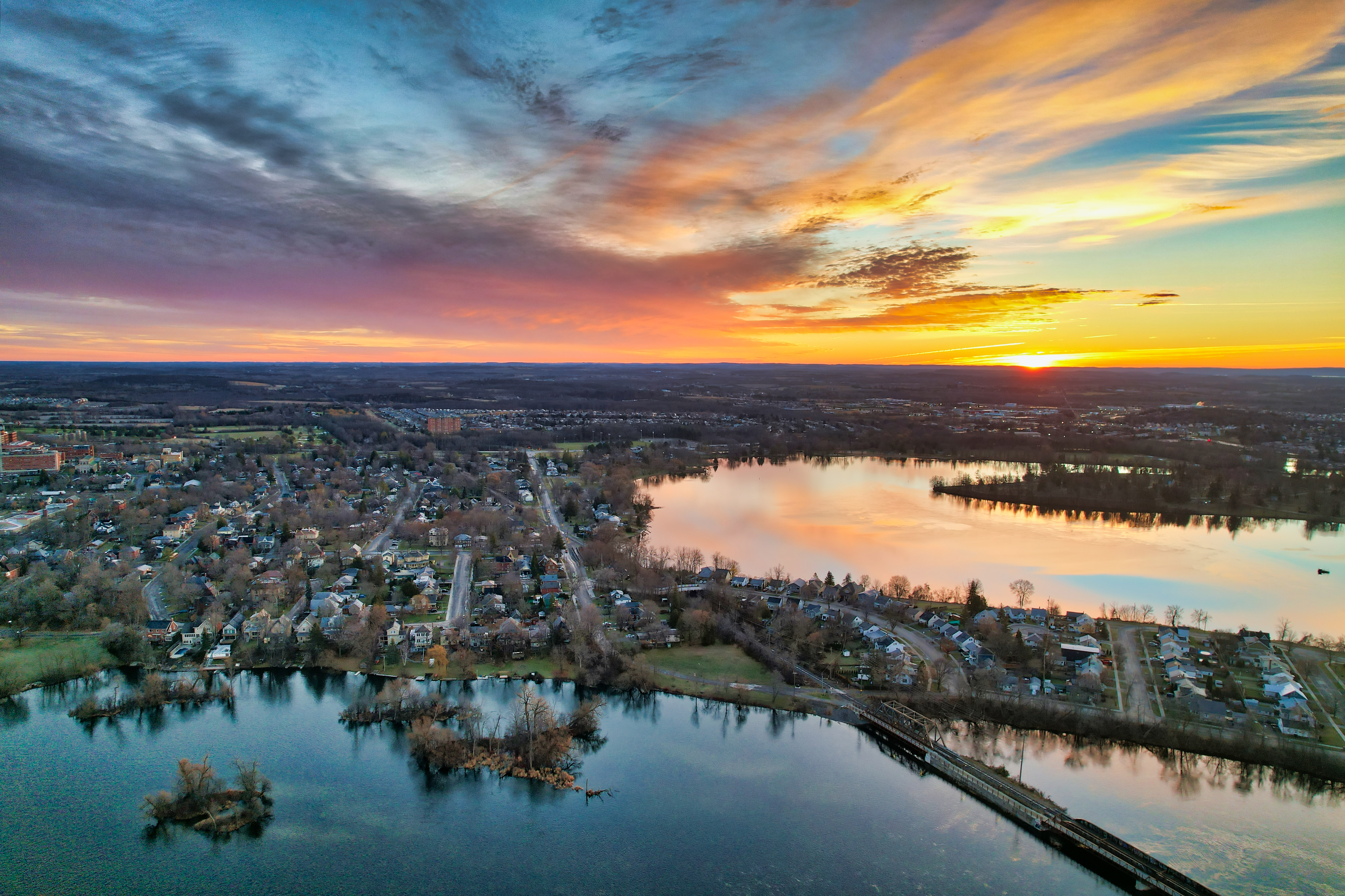 Aerial image of residential neighbourhood on shore of river