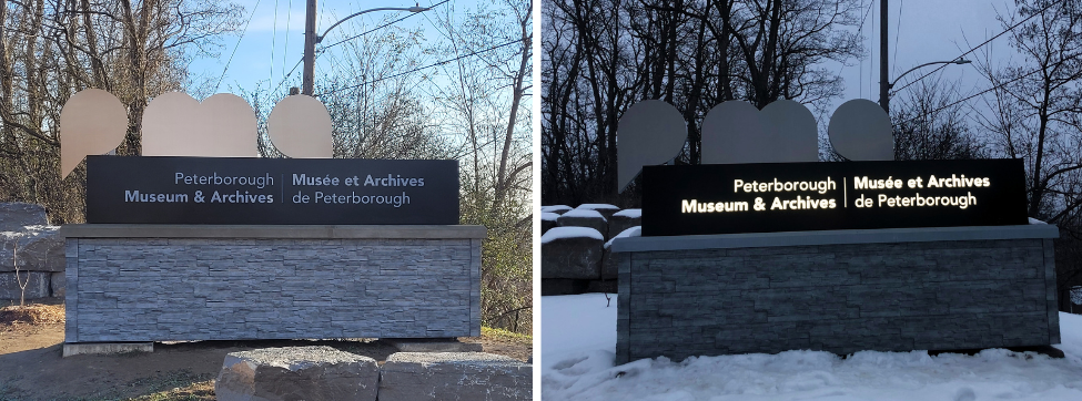 New sign at the entrance to Museum Drive is illuminated at night