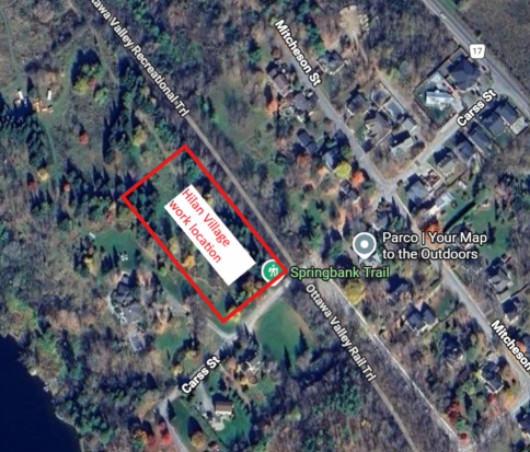 Satellite view of a neighbourhood with a red property outlined in red. Red text inside the marked area reads 'Hilan Village work location.'
