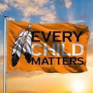 Orange flag with lettering 'Every Child Matters'