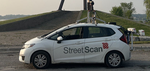 White car with the text 'StreetScan' on the driver's side door