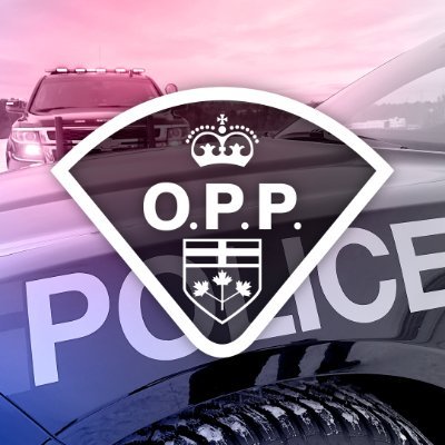 Close up photo of OPP police cruiser in background and the Ontario Provincial Police logo in foreground