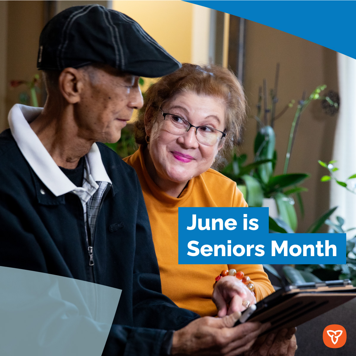 Photo of man and woman sitting next to each other and looking into each others eyes. Text reads 'June is Seniors Month'