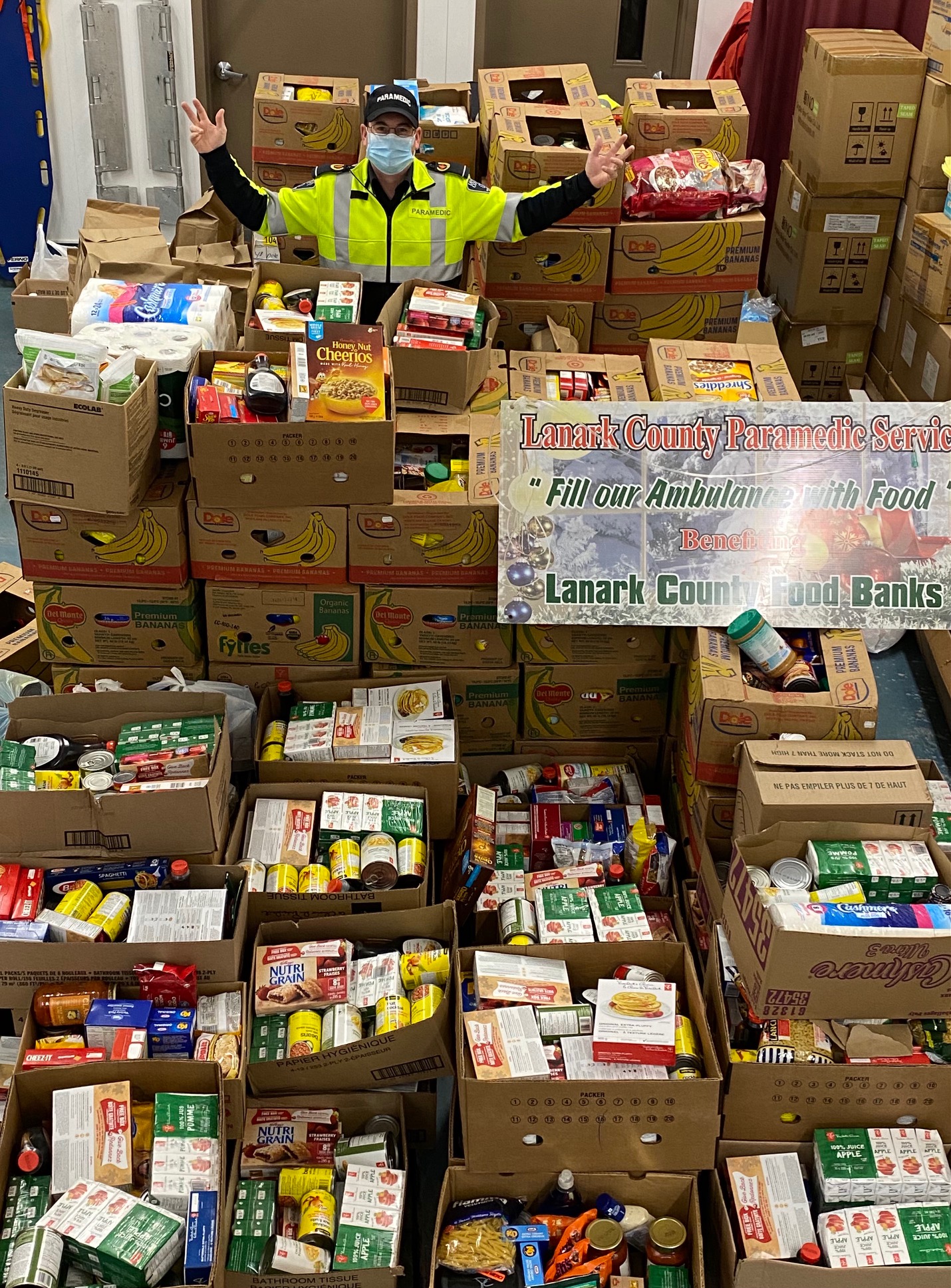 Paramedic Jason Tunks amid all the donations