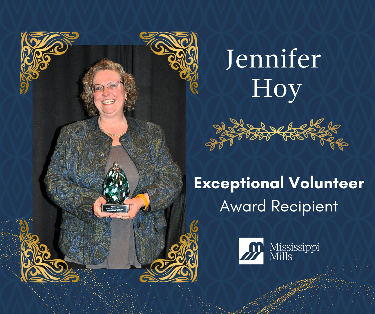Navy background with gold accents shows a woman in a blue and grey blazer, smiling while holding an award. White text reads 'Jennifer Hoy - Exceptional Volunteer Award Recipient.'