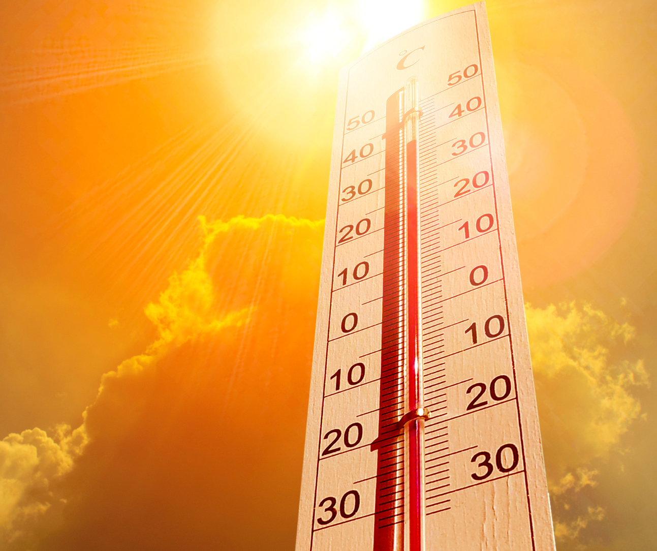Sun shines down on a thermometer