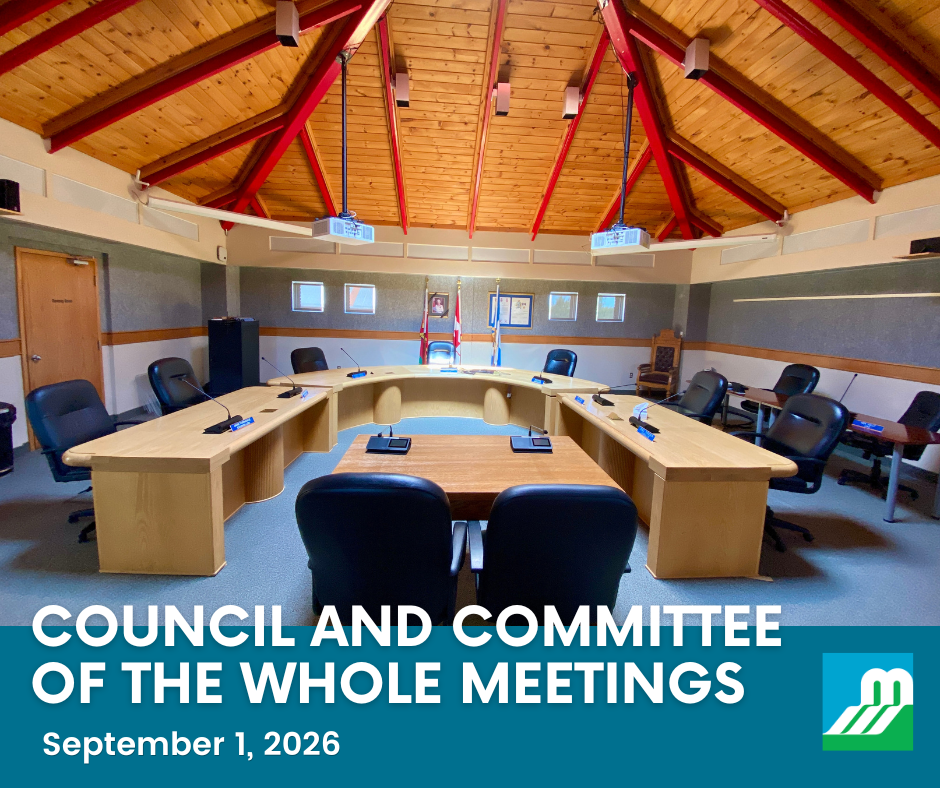 An empty Council Chambers with wooden ceiling and desks shaped in a horseshoe. A blue box at the bottom contains white text reading 'Council and Committee of the Whole Meetings - September 1, 2026.' To the right is a white, blue and green logo with MM spelled out.