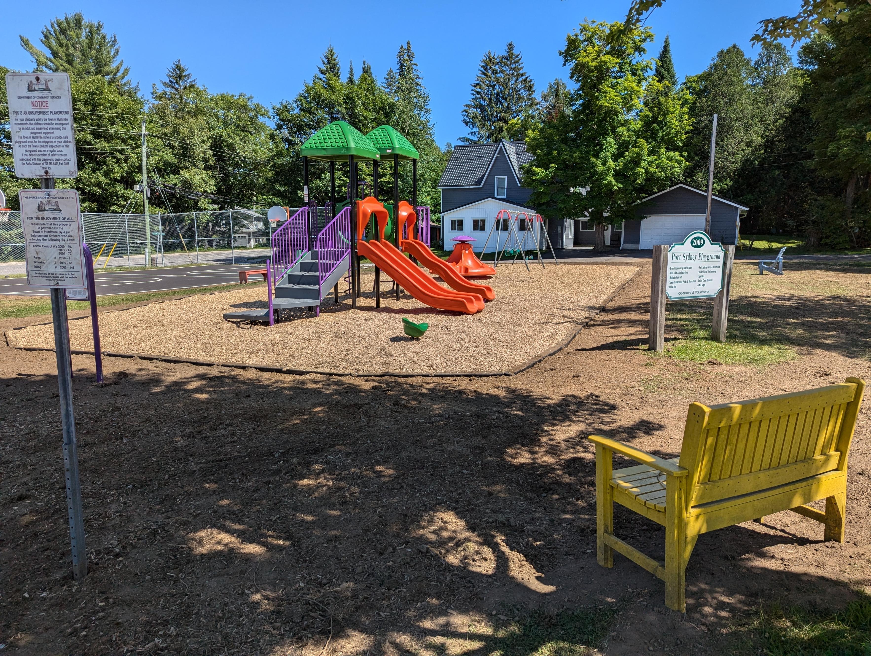 outdoor playground with bars and swings for children