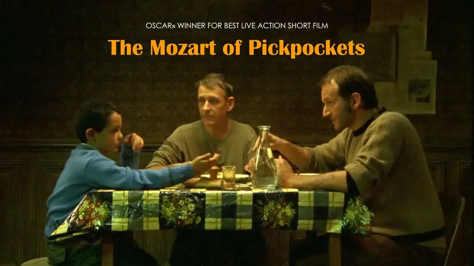 Two men and a boy at a dining table