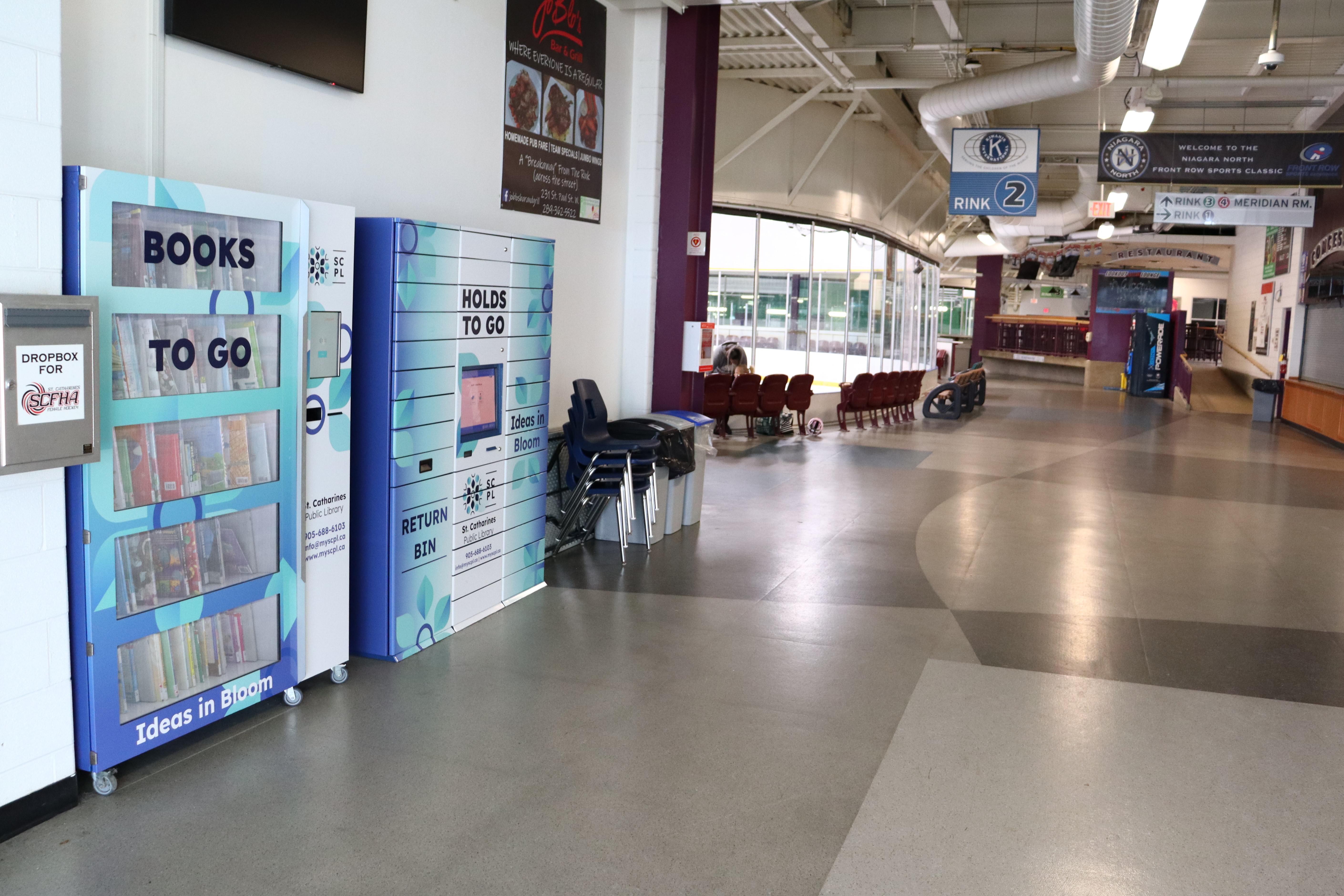 Books-To-Go and Holds-To-Go lockers at the entrance of the Seymour-Hannah Sports and Entertainment Centre.