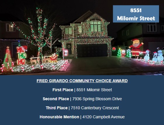 8551 Milomir Street Niagara Falls with exterior holiday lights and decorations.