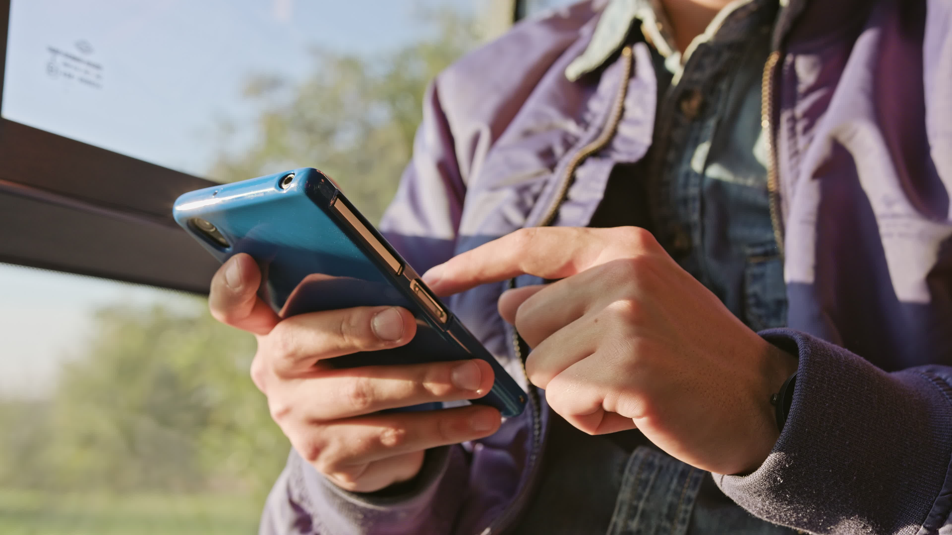 Person Holding Cellphone