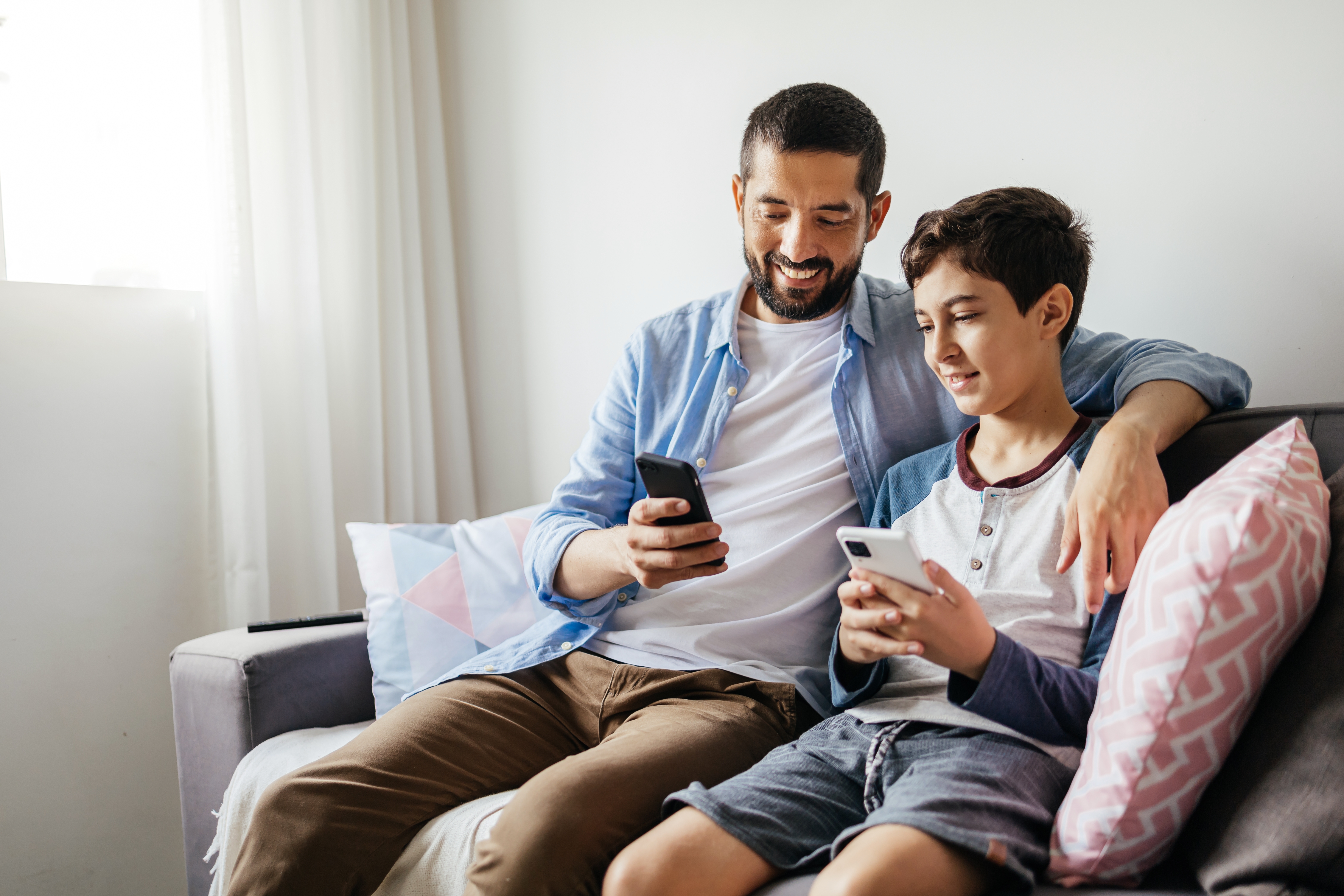 a son and his  Dad on Phones