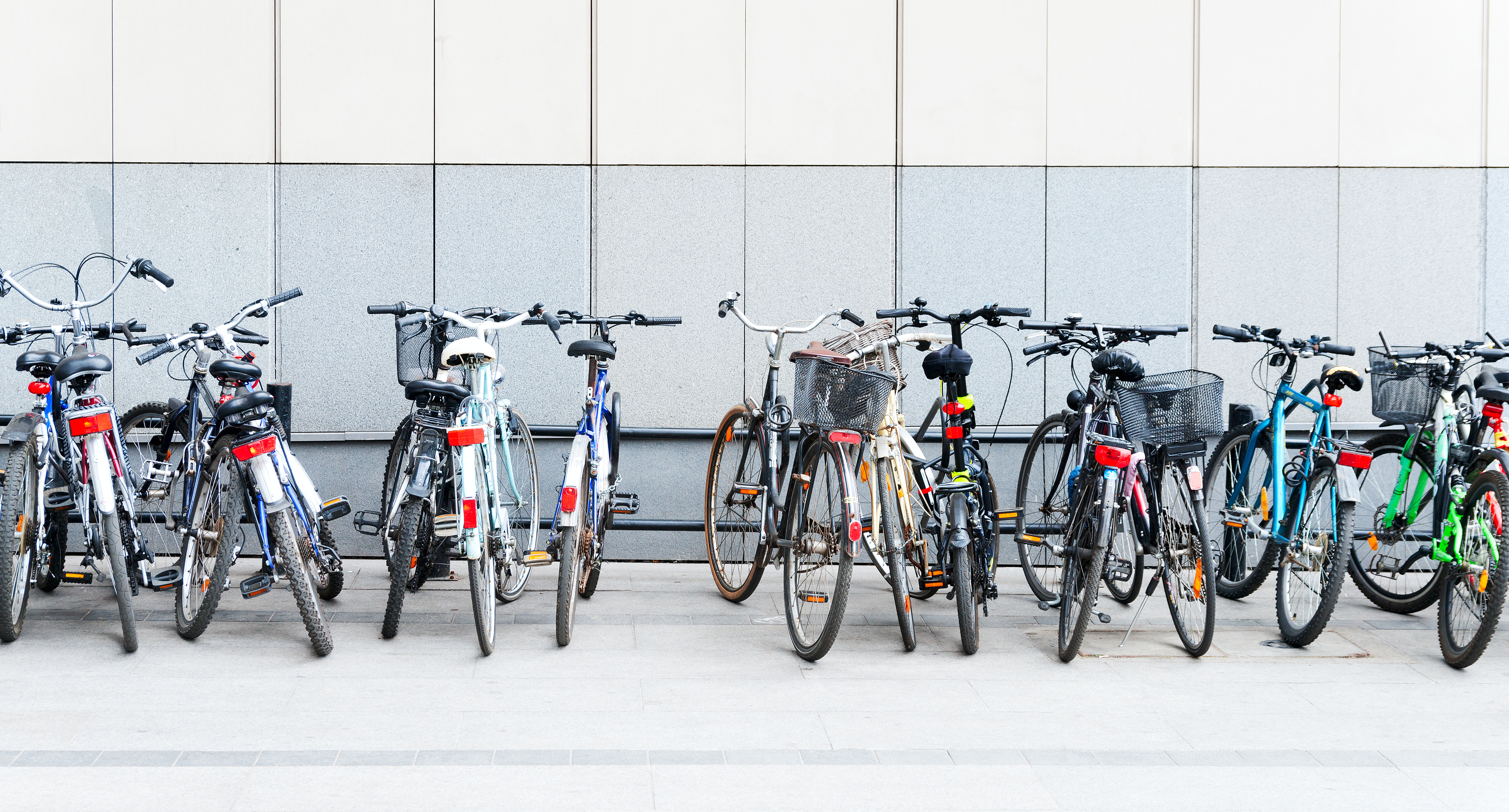 a row of parked bicylces