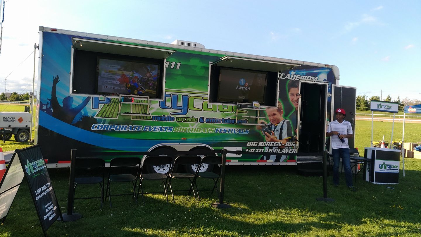arcade trailer in field