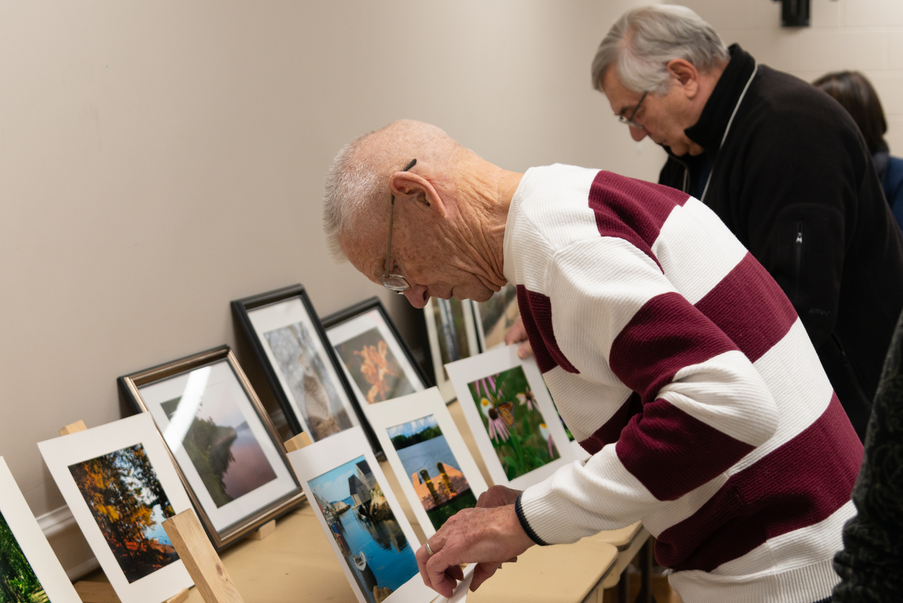 Image of man organizing photos
