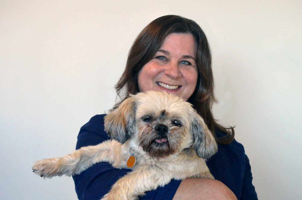 Woman holding a dog