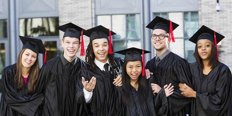 Students in caps and gowns to celebrate graduation