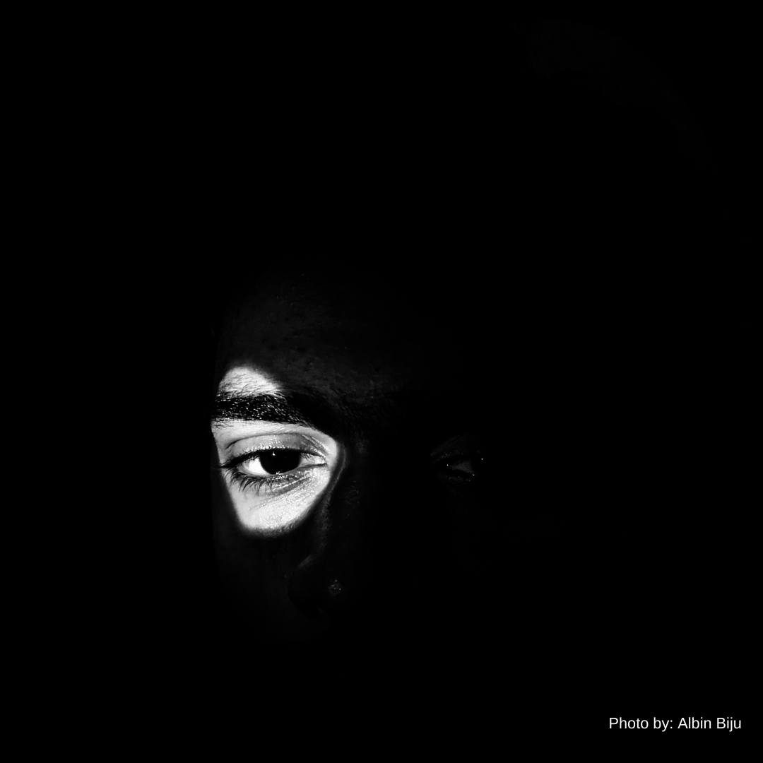 all black background with single image of an eye